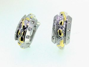 Auskarai Nr.81 (is platinos, puosti geltonu auksu ir briliantais)