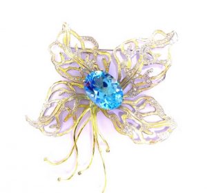 Sege Nr.8 (is geltono aukso, puosta zydruoju topazu ir briliantais)