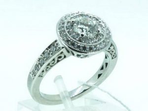 Suzadetuviu ziedas Nr.89 (is balto aukso, puostas brangakmeniais)